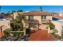 Two-story home with double garage and red tile roof at 7500 E Mccormick Pkwy # 78, Scottsdale, AZ 85258