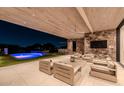 Covered patio with seating area and mountain view at 7537 N Lakeside Ln, Paradise Valley, AZ 85253