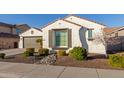 Charming curb appeal with drought-tolerant landscaping at 10496 W Cottontail Ln, Peoria, AZ 85383