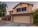 Two-story house with attached garage and landscaping at 1540 W Orchid Ln, Chandler, AZ 85224