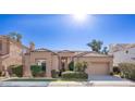 House exterior showcasing Spanish-style architecture and manicured lawn at 1942 W Peninsula Cir, Chandler, AZ 85248