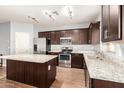 Spacious kitchen featuring granite countertops and stainless steel appliances at 2150 W Alameda Rd # 1112, Phoenix, AZ 85085