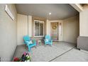 Relaxing front porch with seating and decorative accents at 2441 W Beverly Rd, Phoenix, AZ 85041