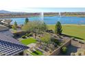 Backyard with artificial turf and lake view at 24454 N 173Rd Ln, Surprise, AZ 85387