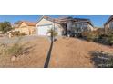 The front yard has desert landscaping with gravel and a few plants at 2602 W Roeser Rd, Phoenix, AZ 85041