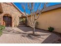 Inviting front entrance with double doors and stone accents at 2952 E Warbler Rd, Gilbert, AZ 85297