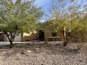 Charming house with desert landscaping, a walkway to the front door, and rock accents at 31655 N 131St Ave, Peoria, AZ 85383