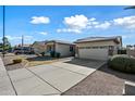 House exterior showcasing landscaping and driveway at 3383 E Santa Fe Ln, Gilbert, AZ 85297