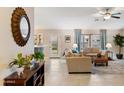 Bright living room with comfortable seating and large windows at 4611 E Red Bird Rd, Cave Creek, AZ 85331