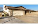 Single-story home with attached garage and driveway at 5732 W Purdue Ave, Glendale, AZ 85302