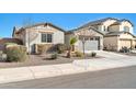 House exterior showcasing landscaping and gray garage door at 8513 N 172Nd Ln, Waddell, AZ 85355