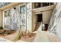 Well-maintained building entrance with stairs and landscaping at 1006 E Osborn Rd # C, Phoenix, AZ 85014