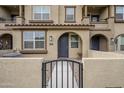 Townhome entrance with gated walkway and small patio at 1255 N Arizona Ave # 1341, Chandler, AZ 85225