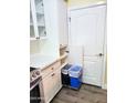 Kitchen featuring built-in pull-out recycling and trash bins at 1701 E Colter St # 223, Phoenix, AZ 85016