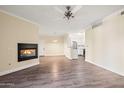 Spacious living room features a fireplace and view to the kitchen at 1701 E Colter St # 223, Phoenix, AZ 85016