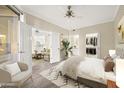 Bright main bedroom offers ample natural light, an ensuite bathroom, walk-in closet, and open layout at 1701 E Colter St # 223, Phoenix, AZ 85016