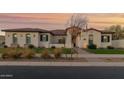 Beautiful 2-story home with landscaped yard and a welcoming entryway at 19780 E Ivy Ln, Queen Creek, AZ 85142