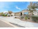 Single-story house with attached garage and desert landscaping at 20017 W Jackson St, Buckeye, AZ 85326