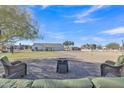 Relaxing backyard with fire pit and seating area at 2344 N Raven --, Mesa, AZ 85207