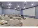 Large home theater with sectional sofa and projector at 2344 N Raven --, Mesa, AZ 85207