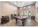 Game room features a pool table and comfortable seating at 5540 E Shea Blvd, Scottsdale, AZ 85254