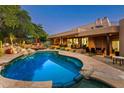 Stunning pool and patio area, perfect for entertaining at 9901 E Hidden Valley Rd, Scottsdale, AZ 85262