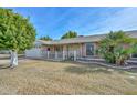 House exterior showing landscaping and driveway at 10432 W El Capitan Cir, Sun City, AZ 85351