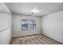 Simple bedroom with neutral carpeting and window coverings at 14210 N 135Th Dr, Surprise, AZ 85379