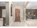 Bright entryway with tiled floors and views into the living room at 1603 E Zion Way, Chandler, AZ 85249