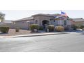 House exterior view with landscaping and flag at 2052 N Montclair Ln, Casa Grande, AZ 85122