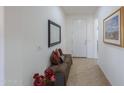 Bright entryway with bench seating and a mirror at 2605 E San Thomas Dr, Casa Grande, AZ 85194