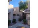 Building exterior showing a walkway and landscaping at 2834 S Extension Rd # 1032, Mesa, AZ 85210