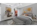 Serene bedroom featuring a neutral color palette, comfortable bedding, and stylish furnishings at 29606 N Tatum Blvd # 216, Cave Creek, AZ 85331