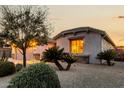 Attractive single-story home with landscaped desert front yard and two-car garage at 30792 N Orange Blossom Cir, San Tan Valley, AZ 85143