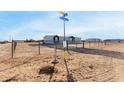 Street view of a home in a desert setting at 36711 W Harrison St, Tonopah, AZ 85354