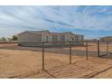 Ranch style home with neutral exterior at 36735 W Harrison St, Tonopah, AZ 85354