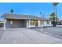 Newly remodeled home with carport and a nicely landscaped front yard at 413 W Marco Polo Rd, Phoenix, AZ 85027