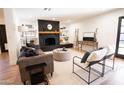 Living room with fireplace, and hardwood floors at 4525 N 82Nd St, Scottsdale, AZ 85251