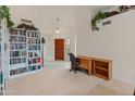 Bright living room with a fireplace and built-in shelves at 5025 E Waltann Ln, Scottsdale, AZ 85254