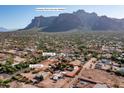 Aerial view showing home, pool, barn, and 3-car garage at 5271 E Shiprock St, Apache Junction, AZ 85119