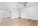 Spacious living room with ceiling fan and light wood floors at 9676 W Mountain View Rd # B, Peoria, AZ 85345