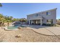 Large backyard with pool, patio, and plenty of space for entertaining at 10406 E Laguna Azul Ave, Mesa, AZ 85209