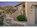 Front entrance with stonework and landscaping at 12 E Foothill Dr, Phoenix, AZ 85020