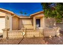 House exterior with a brick facade and a decorative entryway at 1724 W 15Th Ave, Apache Junction, AZ 85120