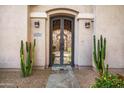 Ornate iron entry gate, desert landscaping at 1805 W Parnell Dr, Phoenix, AZ 85085