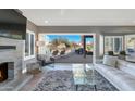 Open living area with glass doors opening to the pool area at 19034 N 94Th Way, Scottsdale, AZ 85255