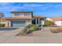 Two-story house with green garage door and mature landscaping at 19222 N 70Th Ave, Glendale, AZ 85308