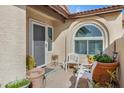 Charming patio area with comfortable seating and potted plants, creating a relaxing outdoor retreat at 2059 E Brown Rd # 23, Mesa, AZ 85213