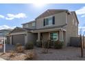 Two-story house with brown garage doors and landscaping at 2071 E Piedmont Pl, Casa Grande, AZ 85122