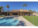 Relaxing backyard with a refreshing pool and spacious patio area at 2265 E Mallard Ct, Gilbert, AZ 85234